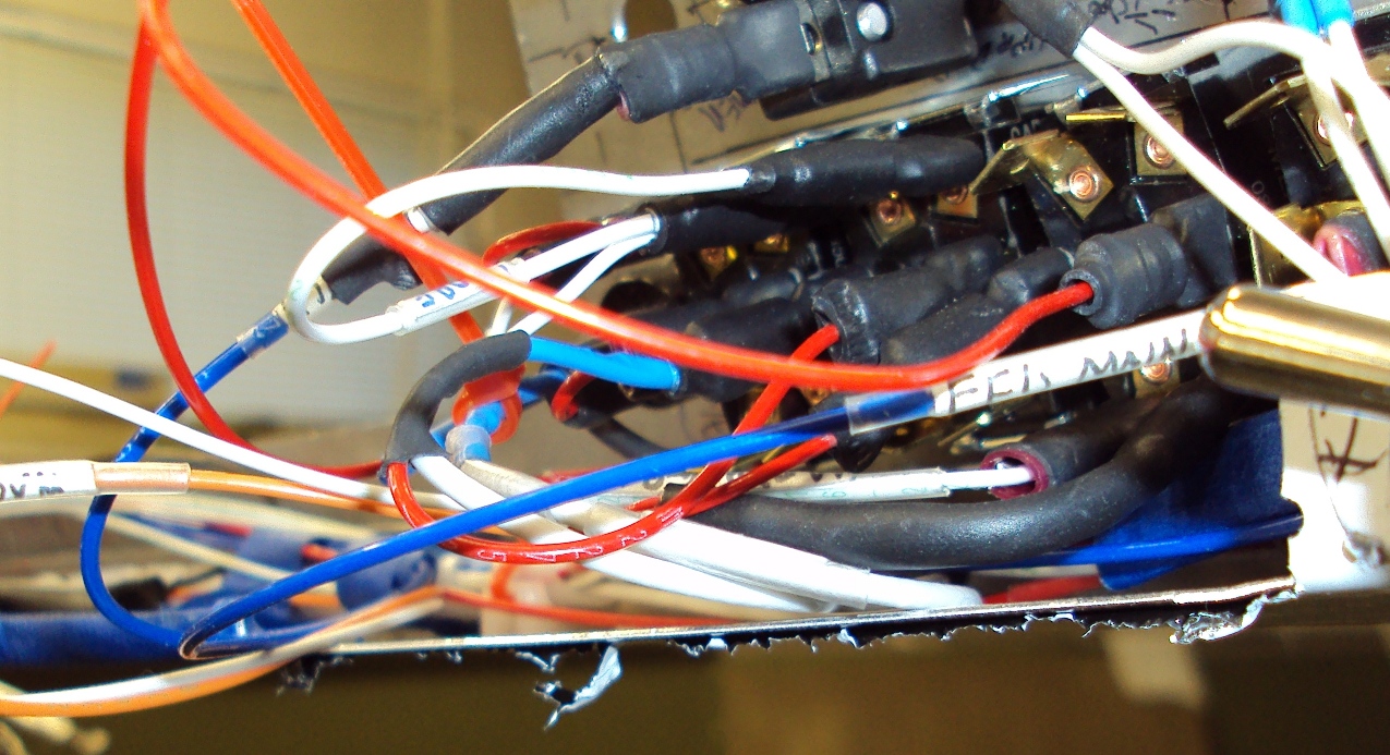 wires resting on instrument panel tray right quarter.jpg